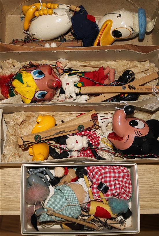 Three Pelham Walt Disney puppets, Donald Duck, Pinocchio and Minnie Mouse, with original boxes (a.f.) and three other small puppets